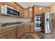 Kitchen with stainless appliances, granite counters, and modern fixtures at 8547 Benidorm Ave, Las Vegas, NV 89178
