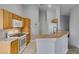 Well-equipped kitchen with stainless steel appliances, lots of storage, and granite countertops at 8675 Traveling Breeze Ave # 101, Las Vegas, NV 89178