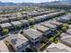 Stunning aerial view of the neighborhood showcasing the beautiful desert landscape and mountain views at 888 Cherry Glen Pl, Las Vegas, NV 89138