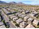 Picturesque aerial shot of the neighborhood with mountain views and well-maintained streets and landscaping at 888 Cherry Glen Pl, Las Vegas, NV 89138