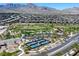 Aerial view of the community park, highlighting the tennis courts, playground, and green spaces at 888 Cherry Glen Pl, Las Vegas, NV 89138