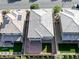 An aerial view shows the backyard of this property with desert landscaping, a covered patio, and a small putting green at 888 Cherry Glen Pl, Las Vegas, NV 89138