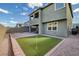 Entertaining backyard featuring a putting green, patio, and rock landscaping at 888 Cherry Glen Pl, Las Vegas, NV 89138