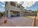Beautiful backyard with putting green, brick patio and covered dining area at 888 Cherry Glen Pl, Las Vegas, NV 89138