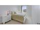 Cozy bedroom features a plush bed, side table, and window with neighborhood view at 888 Cherry Glen Pl, Las Vegas, NV 89138