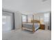 Spacious main bedroom with neutral tones, large windows, and a wooden bed frame at 888 Cherry Glen Pl, Las Vegas, NV 89138