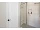 Bathroom with clear glass shower and tiled shower with built-in seat at 8929 Cassia Winds St, Las Vegas, NV 89166