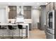 Contemporary kitchen featuring stainless steel appliances and modern cabinetry at 8929 Cassia Winds St, Las Vegas, NV 89166