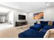 Inviting living room with entertainment center and comfortable seating area at 8929 Cassia Winds St, Las Vegas, NV 89166