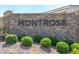 Stone monument sign with the community name, Montrose, and manicured shrubs at 8929 Cassia Winds St, Las Vegas, NV 89166