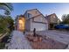 Charming two-story home with a well-maintained front yard and two car garage at 9013 Cypress Point Way, Las Vegas, NV 89117