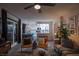 Open-concept living room and kitchen area is great for entertaining and modern living at 9013 Cypress Point Way, Las Vegas, NV 89117