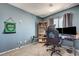 This bedroom features a desk, computer setup, and a comfortable gaming chair at 9065 Adorable Ave, Las Vegas, NV 89149