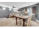 Living room with dining area and cozy seating arrangement at 9065 Adorable Ave, Las Vegas, NV 89149