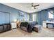 Stylish main bedroom with a ceiling fan, neutral decor, and a vanity area at 9065 Adorable Ave, Las Vegas, NV 89149