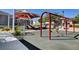 Community playground with swings, slides, and shaded areas for children to play at 9065 Adorable Ave, Las Vegas, NV 89149