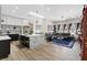 A modern, open kitchen with a center island flows into a comfortable living space at 9096 Nomo St, Las Vegas, NV 89123