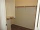 Walk-in closet with shelves and rod, providing ample storage space at 9470 Peace Way # 112, Las Vegas, NV 89147