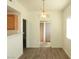 Bright dining area with chandelier and breakfast bar, perfect for gatherings at 9470 Peace Way # 112, Las Vegas, NV 89147