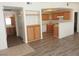 Spacious open floorplan with kitchen, built-in cabinets, and bathroom access at 9470 Peace Way # 112, Las Vegas, NV 89147