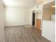 Bright living room featuring wood floors and a neutral color palette at 9470 Peace Way # 112, Las Vegas, NV 89147