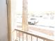 View from the patio showing a parked car under a covered parking area at 9470 Peace Way # 112, Las Vegas, NV 89147