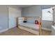 Bedroom showcasing a bed with storage underneath, a closet, and neutral-toned walls with natural light at 9780 Ziegler Ave, Las Vegas, NV 89148