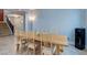 Bright dining space situated near the staircase and front entry, perfect for gatherings at 9780 Ziegler Ave, Las Vegas, NV 89148