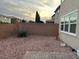 Low-maintenance backyard featuring rock landscaping and a durable brick-paver patio at , Las Vegas, NV 89148