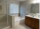 Bathroom with tub, separate glass shower and vanity with storage at , Las Vegas, NV 89148