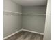 Walk-in closet with custom shelving for optimal storage at , Las Vegas, NV 89148