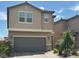 Two-story home featuring desert landscaping and a two-car garage at , Las Vegas, NV 89148