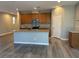 Open-concept kitchen with granite island, stainless appliances, and seamless living space at , Las Vegas, NV 89148
