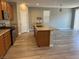 Open floor plan featuring a kitchen with an island, appliances and plenty of natural light at , Las Vegas, NV 89148