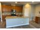 Spacious kitchen with a large island, stainless steel appliances, and ample cabinet space at , Las Vegas, NV 89148