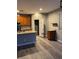 Open kitchen with stainless steel appliances, an island and gray flooring at , Las Vegas, NV 89148