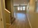 A spacious, light-filled living room features hardwood floors and large windows at , Las Vegas, NV 89148
