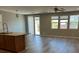 Spacious living room area with hardwood floors, ceiling fan, and many windows at , Las Vegas, NV 89148
