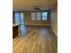 Open living space with gray flooring and plenty of natural light at , Las Vegas, NV 89148