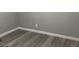 Bright room with plank flooring and fresh neutral paint at , Las Vegas, NV 89148