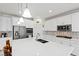 Spacious kitchen with a large island, stainless steel appliances, and ample cabinet space at 10127 Knotty Skye Ave, Las Vegas, NV 89166