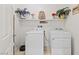 Laundry room featuring side by side washer and dryer, and decorative shelf at 10127 Knotty Skye Ave, Las Vegas, NV 89166