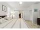 Bright main bedroom with sliding door, window, and modern decor at 10127 Knotty Skye Ave, Las Vegas, NV 89166