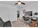 Bedroom includes a closet, television and futon at 10415 Sadie Blake Ave, Las Vegas, NV 89166