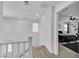 Bright hallway with view into bedroom with dark accents at 10415 Sadie Blake Ave, Las Vegas, NV 89166
