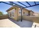 Spacious balcony features an overhead pergola and views of the city at 10520 Maystar Ln, Las Vegas, NV 89135