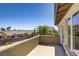 This home has a cozy balcony offering neighborhood views and an abundance of natural light at 10520 Maystar Ln, Las Vegas, NV 89135