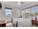 Bright bedroom featuring a plush carpet, neutral walls, and mountain views at 10520 Maystar Ln, Las Vegas, NV 89135
