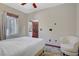 Simple bedroom with carpet, and chair at 10520 Maystar Ln, Las Vegas, NV 89135