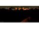 Night view of the city skyline, showcasing the vibrant lights and energy of the urban landscape at 10520 Maystar Ln, Las Vegas, NV 89135